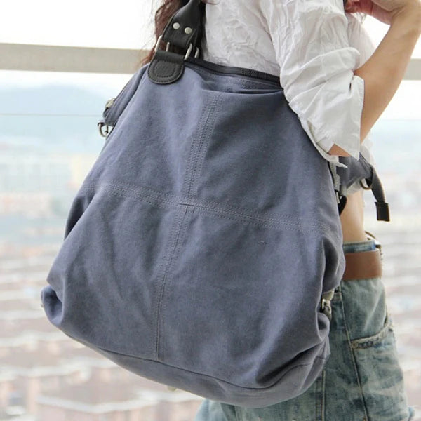 Blue canvas shoulder bag.