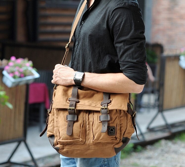 Large unisex fabric bag with adjustable strap for shoulder or crossbody wear