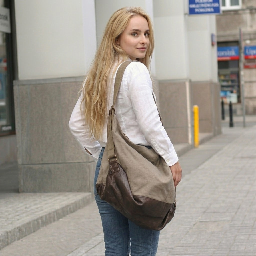 Women's bucket bag in a coffee with milk color worn on the shoulder