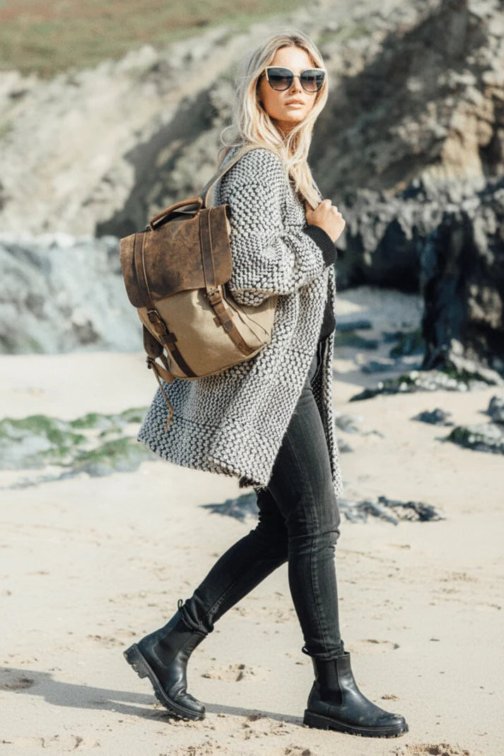 Woman with a vintage-style canvas women's backpack on a walk
