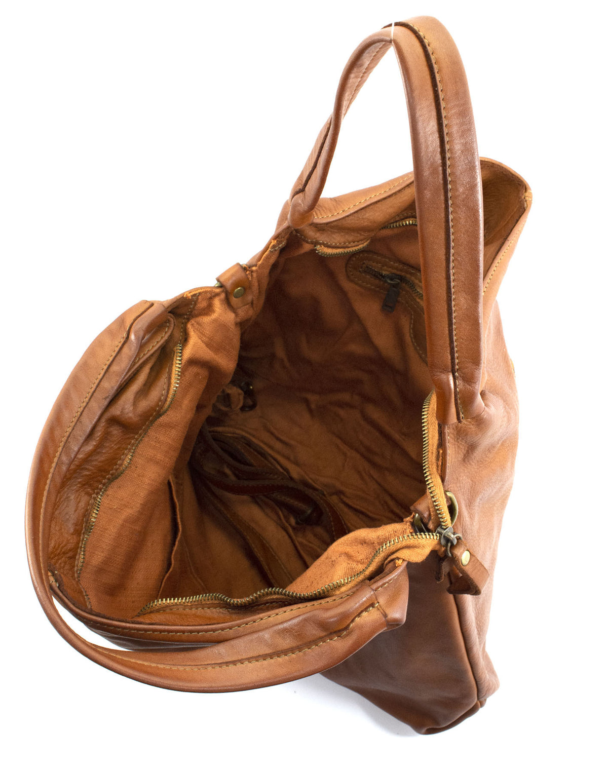 Intérieur d'un sac à main en cuir avec doublure en coton et trois poches